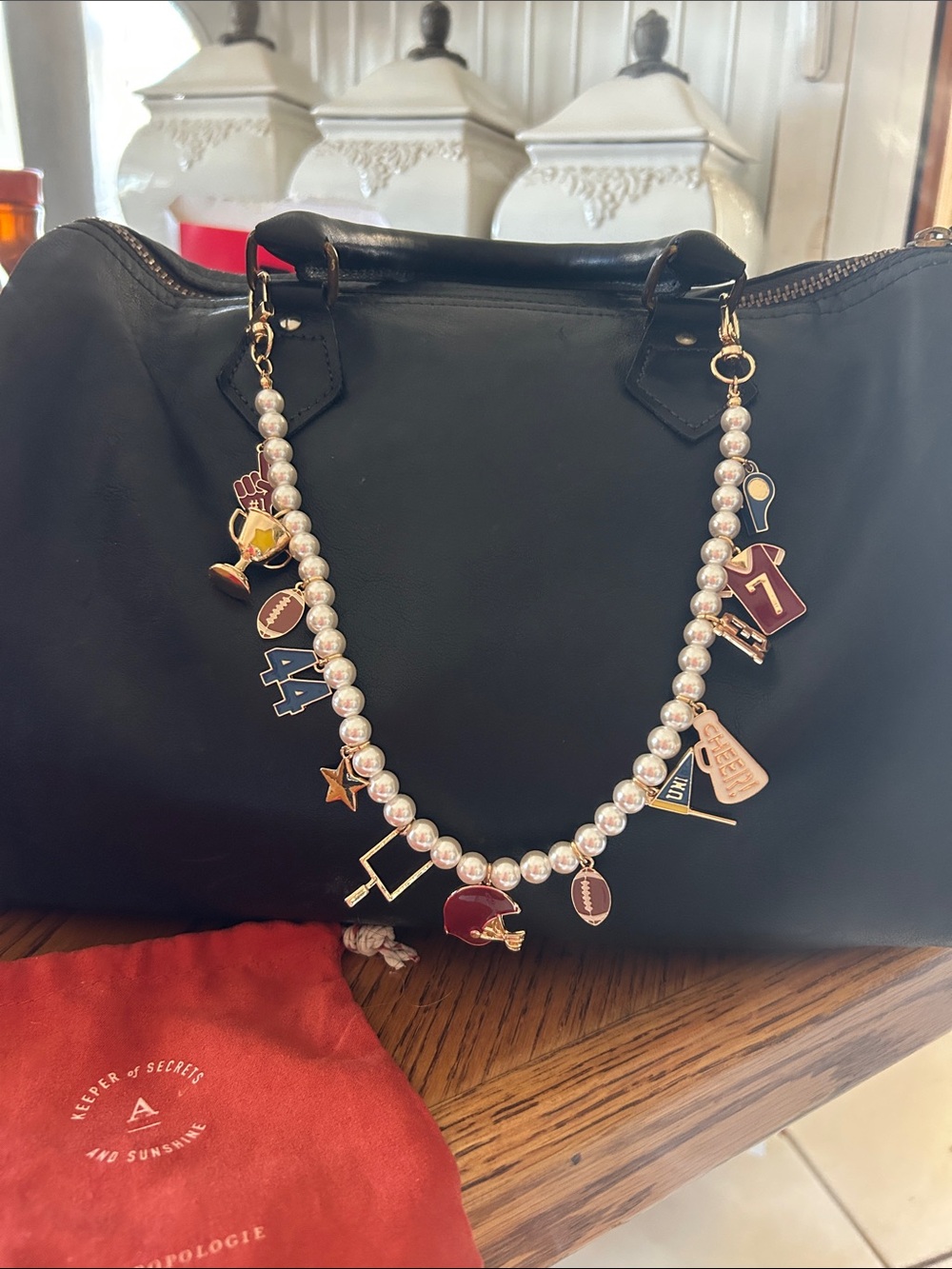 Anthropologie Pearl Charm Football Necklace Bag Strap - Black
